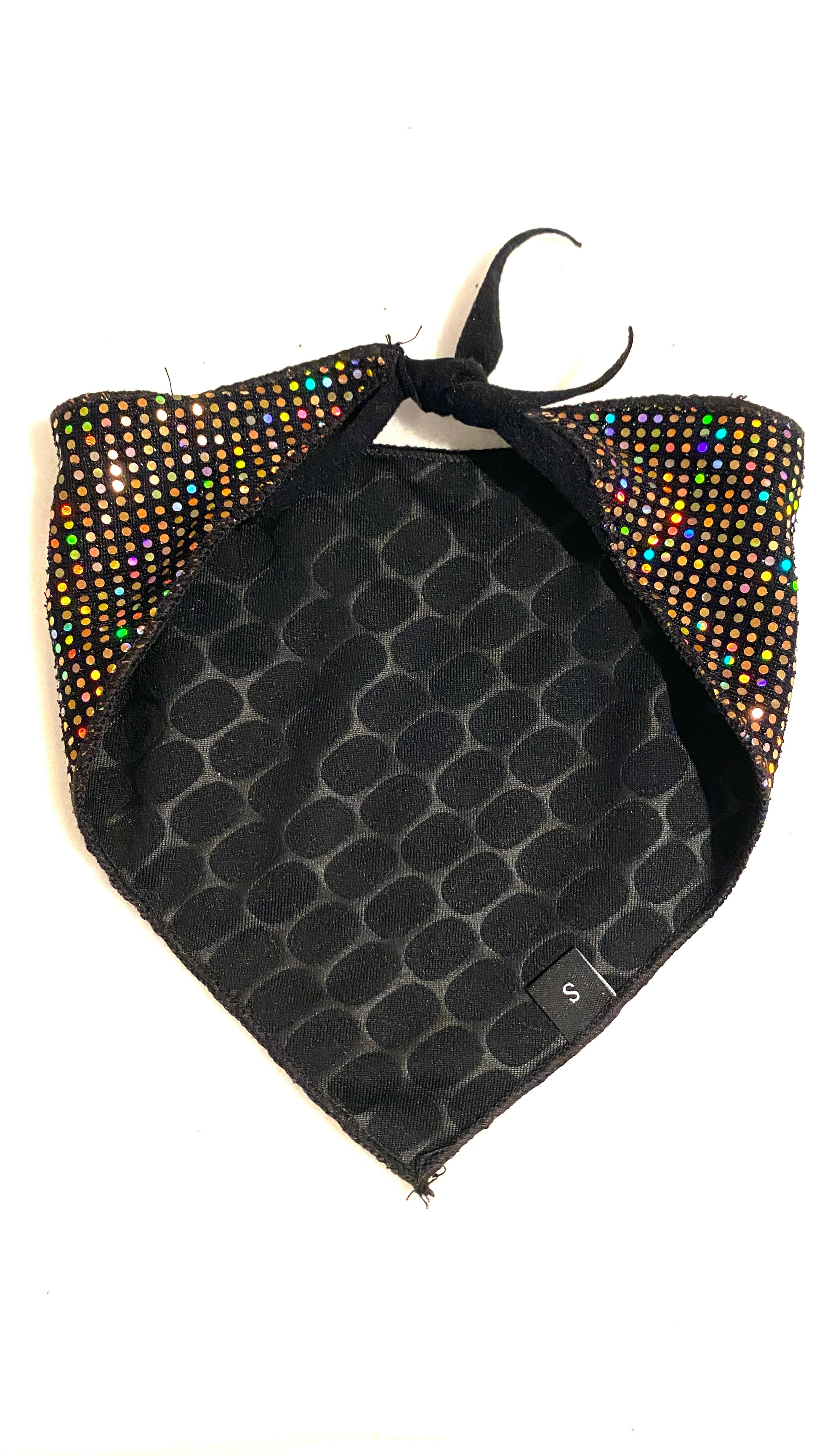 Black backside of a dog bandana with gold holographic sparkles on a white background